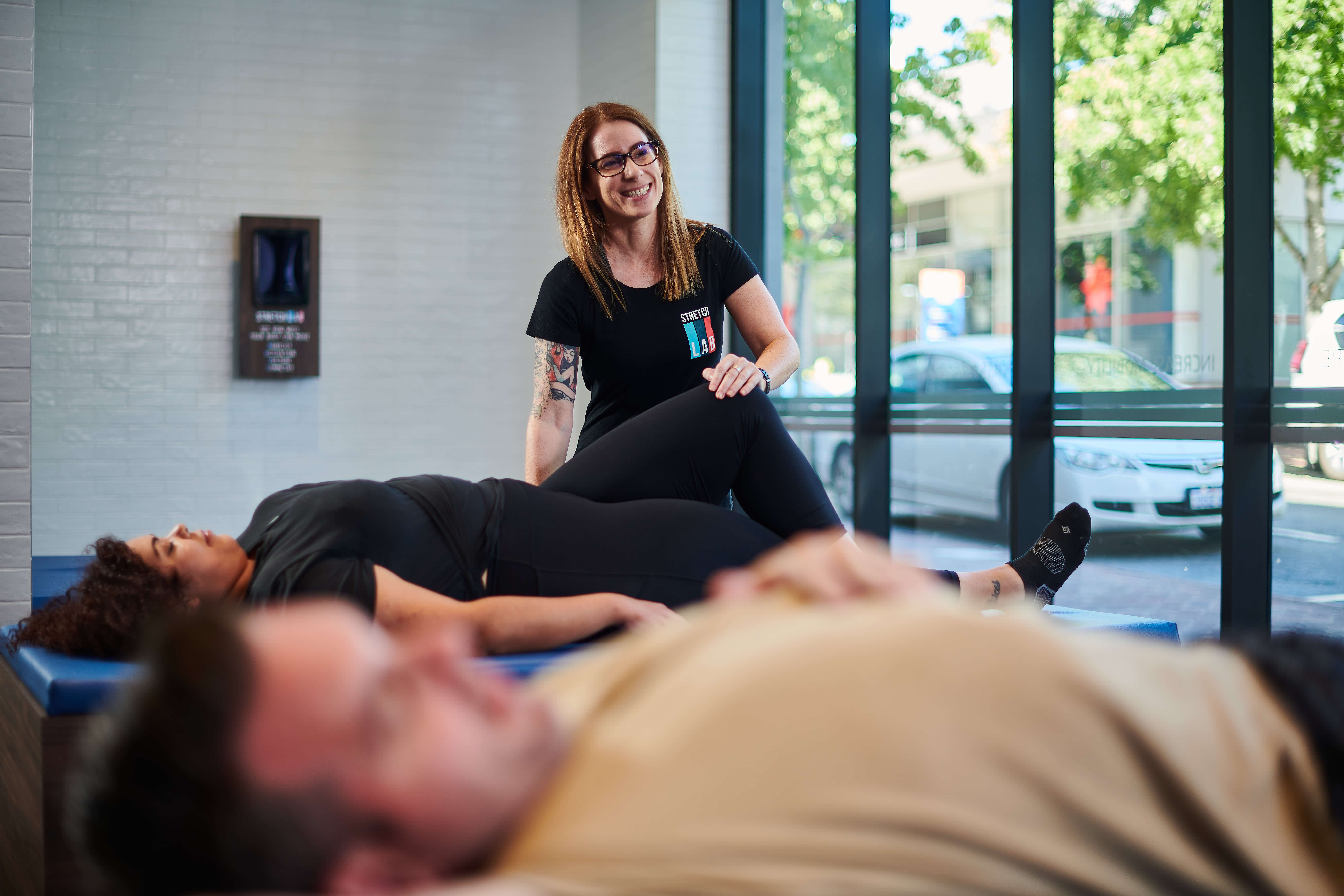 instructor talking about the benefits of PNF stretching
